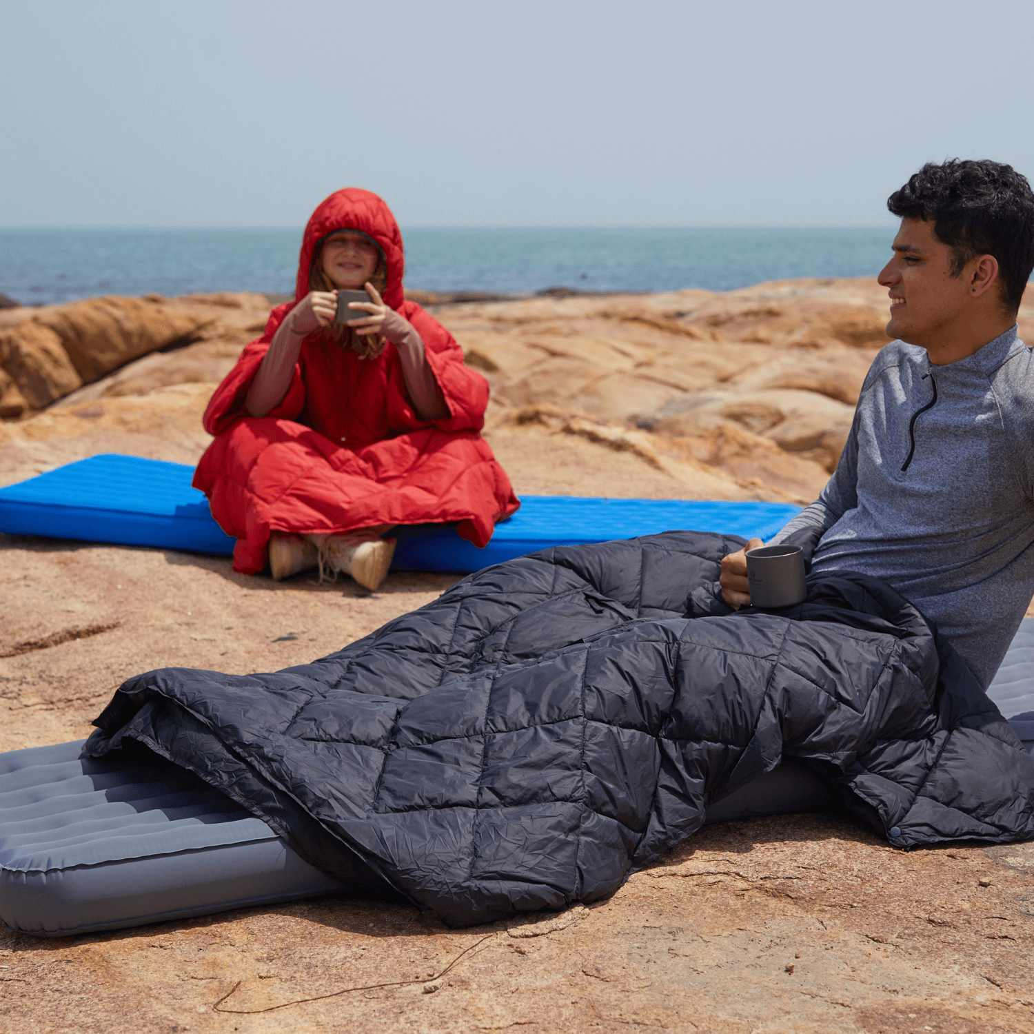Insulated sleeping pad providing full body support on uneven ground