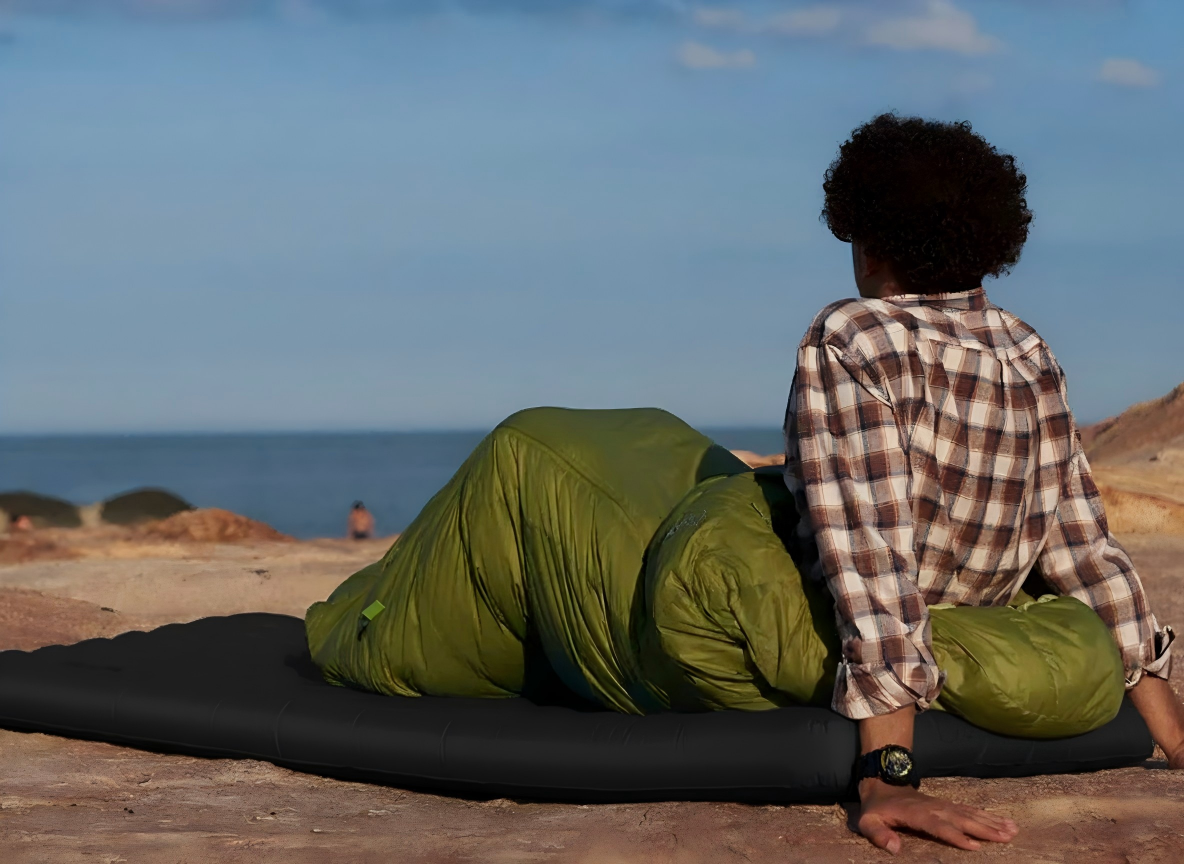 Self inflating black sleeping pad for durable outdoor comfort