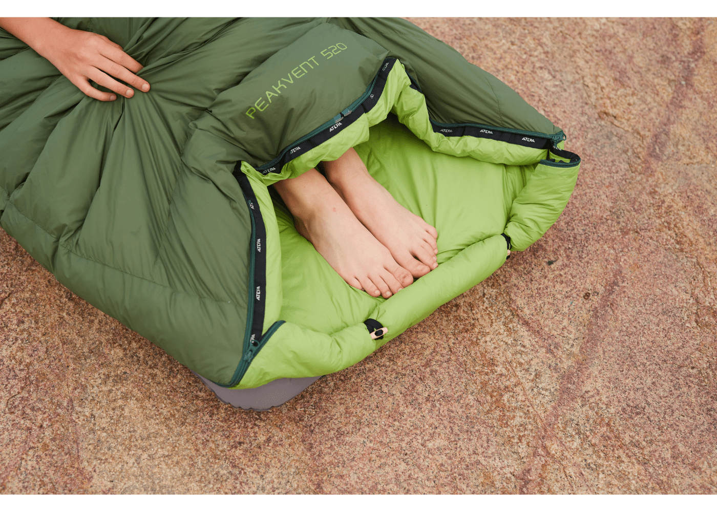 Close-up of sleeping bag double zipper and precise stitching
